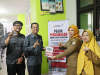 Dokumentasi Bawaslu Kota Balikpapan Menyerahkan Buku-Buku Kepemiluan